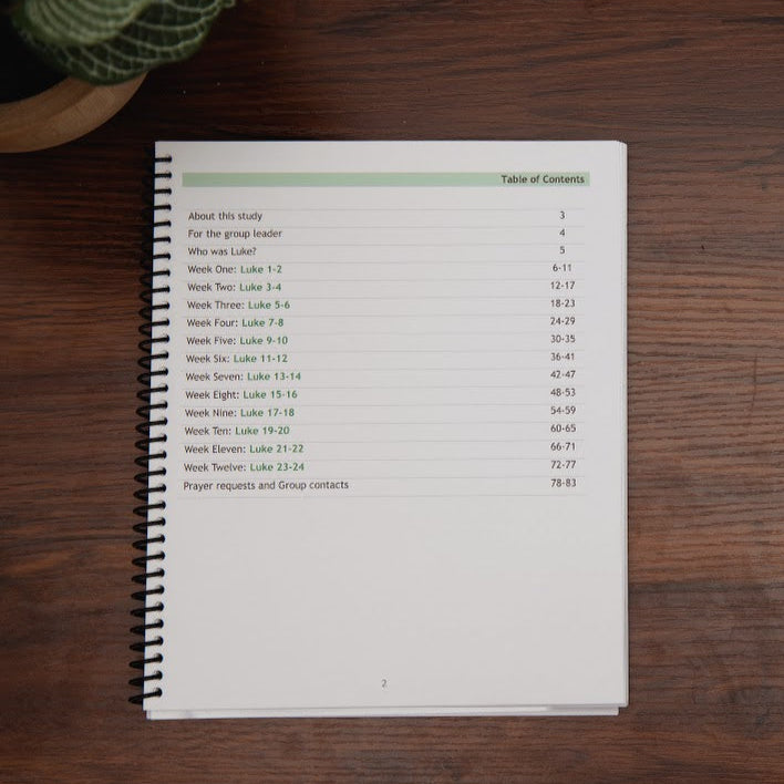 Table of contents: Know for Sure, study of Gospel of Luke workbook; on wood table